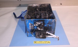 NTSB photo of the burned auxiliary power unit battery from a JAL Boeing 787 that caught fire on Jan. 7 at Boston’s Logan International Airport.