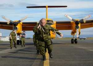 The 407 Servicing team, gave it their all during a Buffalo Pulling competition, in support of the 2013 United Way fundraising season on 13 Nov 2013.  Teams composed of 10 people competed in a timed event in which each team must pull a 35-ton CC-115 Buffalo across the 19 Wing tarmac. 